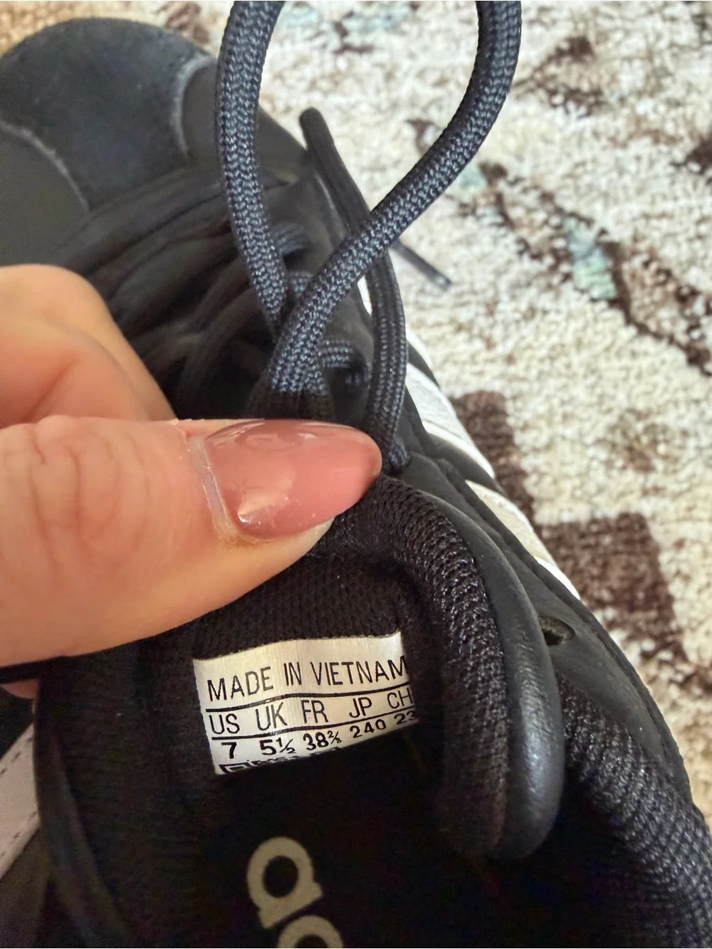 adidas Women’s Black Sneakers with White Stripes and Gum Platform